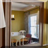 D19. Silver framed mirror .35”h x 29”w 